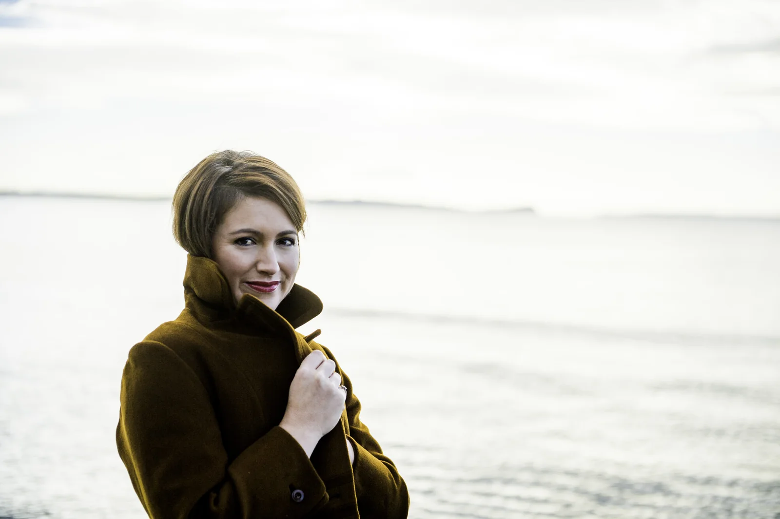 Moody coastal wellness brand portrait by Lola Media