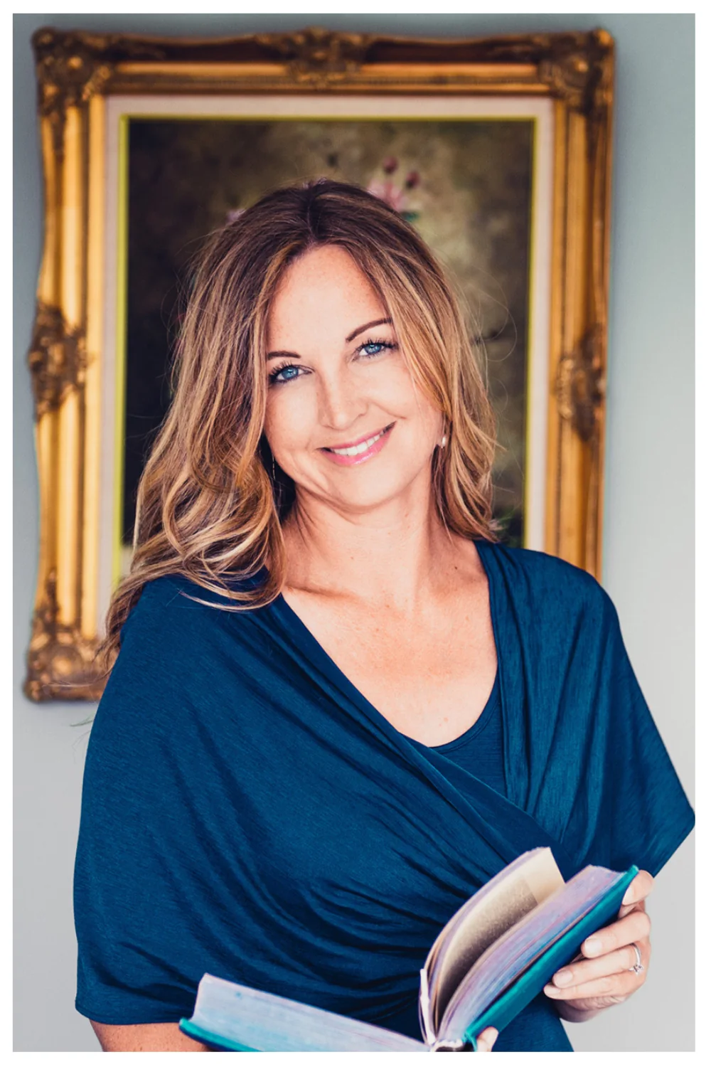 Wellness brand portrait in a gold frame by Lola Media