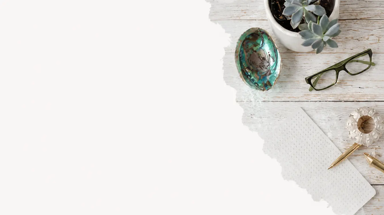 Styled flatlay with paua shell, succulent and glasses on a whitewashed table — Lola Media brand styling